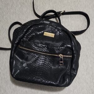 BCBG Black Quilted Mini Backpack with Gold Accents